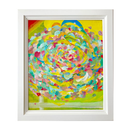 A flower blooming on scrap wood